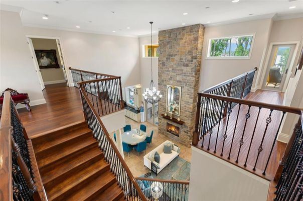 Dining room, Fireplace, Interior, Living room, Pendant Lights, Recessed Lighting, Stone Walls, Wood Texture Flooring