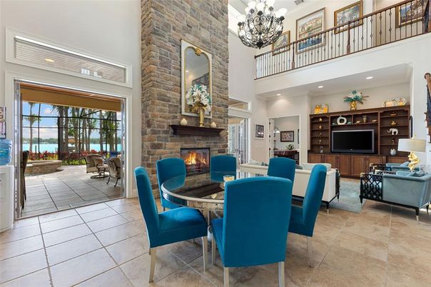 Chandelier, Dining room, Fireplace, Interior, Living room, Recessed Lighting, Stone Walls