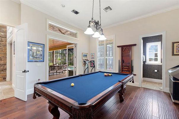 Billiard Table, Game Room, Interior, Pendant Lights, Stone Walls, Wood Texture Flooring
