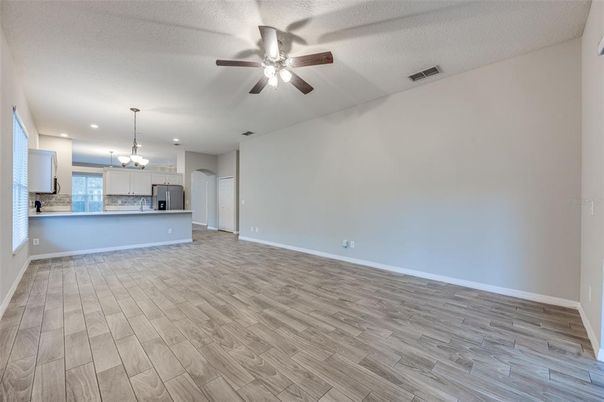 Chandelier, Empty room, Interior, Kitchen, Pendant Lights, Recessed Lighting, Wood Texture Flooring