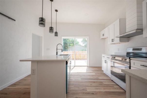 Interior, Kitchen, Pendant Lights, Stainless Steel Appliances, Wood Texture Flooring