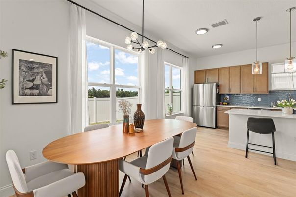 Dining room, Interior, Kitchen, Pendant Lights, Recessed Lighting, Stainless Steel Appliances, Wood Texture Flooring