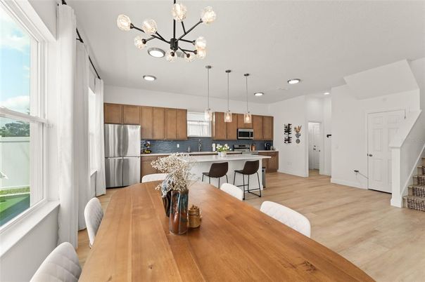Dining room, Interior, Kitchen, Pendant Lights, Recessed Lighting, Stainless Steel Appliances, Wood Texture Flooring