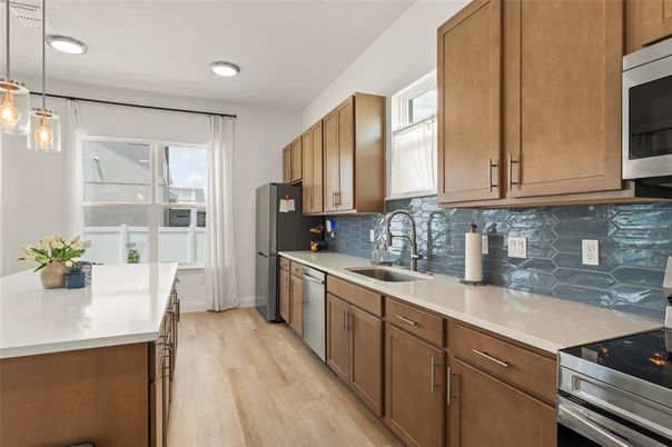 Interior, Kitchen, Pendant Lights, Recessed Lighting, Stainless Steel Appliances, Wood Texture Flooring