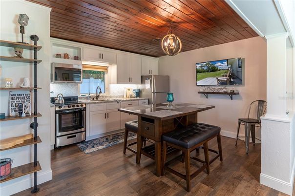 Dining room, Interior, Kitchen, Pendant Lights, Stainless Steel Appliances, Wooden Ceilings, Wood Texture Flooring