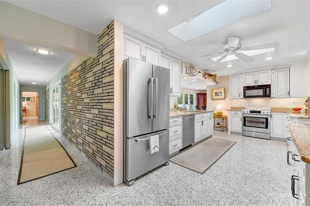 Interior, Kitchen, Recessed Lighting, Stainless Steel Appliances, Stone Walls