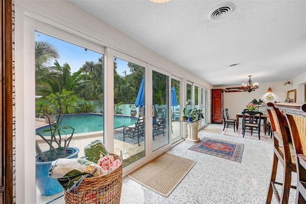 Chandelier, Dining room, Interior, Piano, Pool