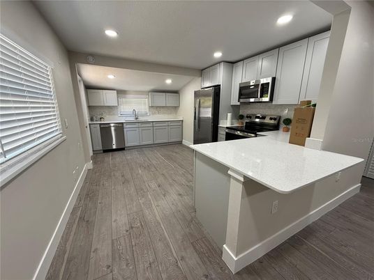 Interior, Kitchen, Recessed Lighting, Stainless Steel Appliances, Wood Texture Flooring