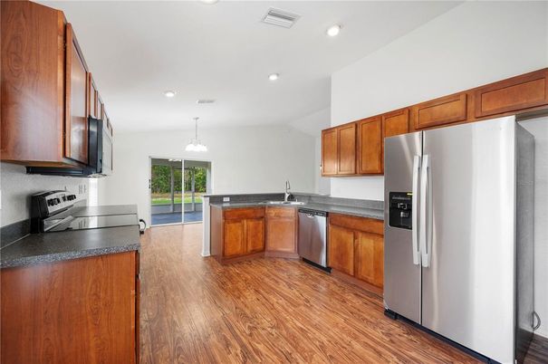 Interior, Kitchen, Pendant Lights, Recessed Lighting, Stainless Steel Appliances, Wood Texture Flooring