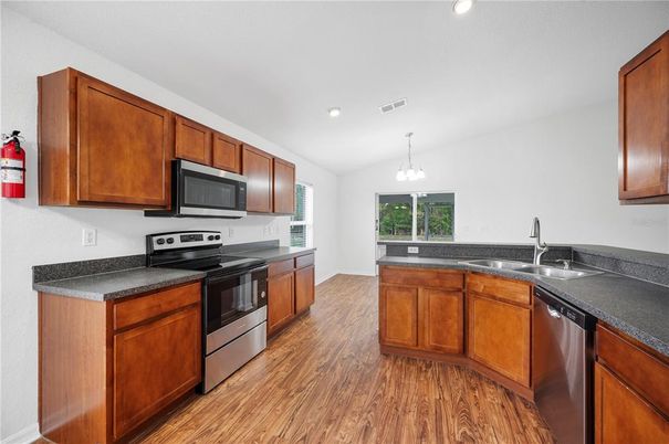 Interior, Kitchen, Pendant Lights, Recessed Lighting, Stainless Steel Appliances, Wood Texture Flooring