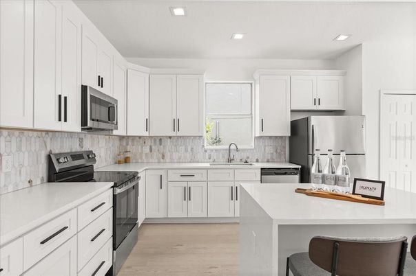 Interior, Kitchen, Recessed Lighting, Stainless Steel Appliances, Wood Texture Flooring