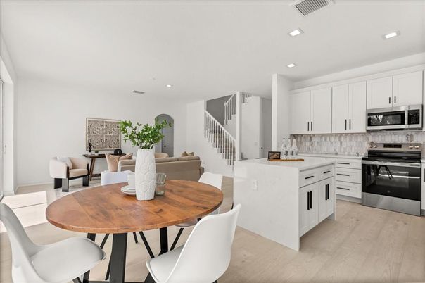 Dining room, Interior, Kitchen, Recessed Lighting, Stainless Steel Appliances, Wood Texture Flooring