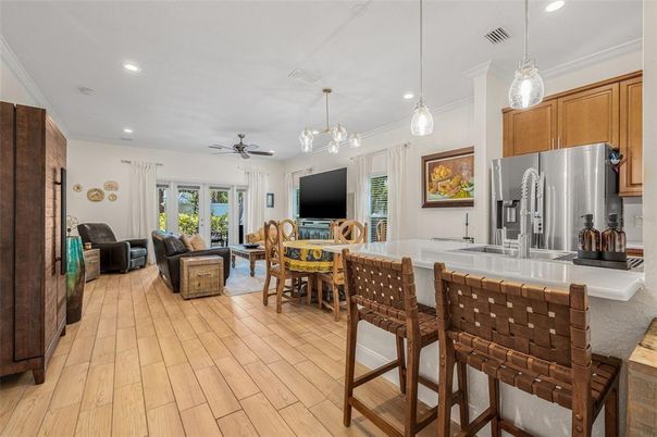 Dining room, Interior, Kitchen, Living room, Pendant Lights, Recessed Lighting, Stainless Steel Appliances, Wood Texture Flooring