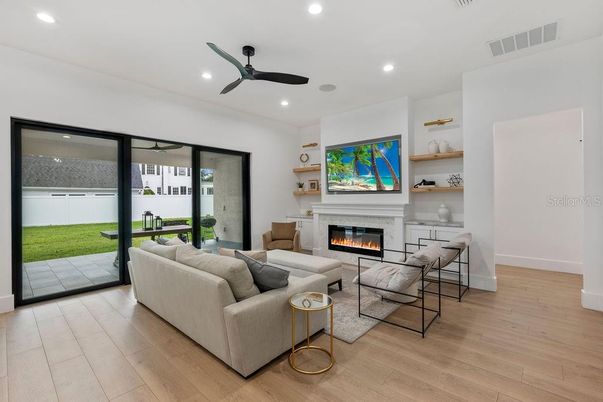 Fireplace, Interior, Living room, Recessed Lighting, Wood Texture Flooring