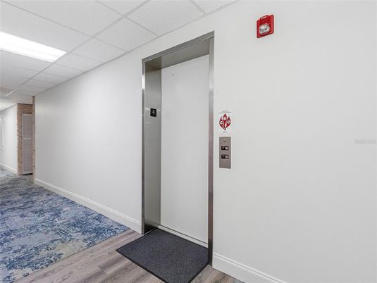 Elevator, Interior, Recessed Lighting, Wood Texture Flooring