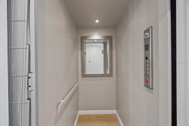 Elevator, Interior, Recessed Lighting, Wood Texture Flooring
