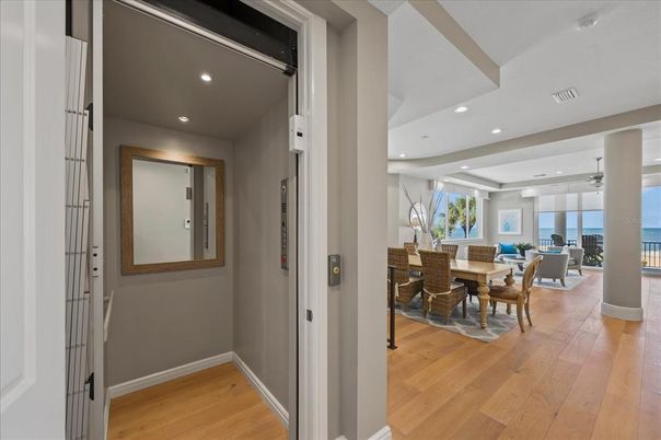 Dining room, Elevator, Interior, Recessed Lighting, Water, Wood Texture Flooring