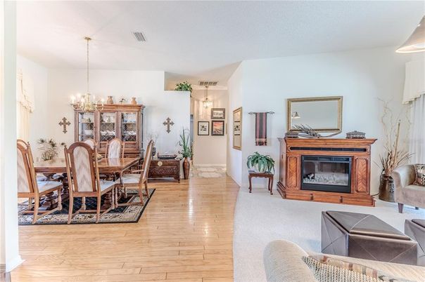 Chandelier, Dining room, Fireplace, Interior, Pendant Lights, Wood Texture Flooring