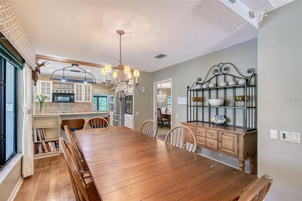 Chandelier, Dining room, Interior, Wood Texture Flooring