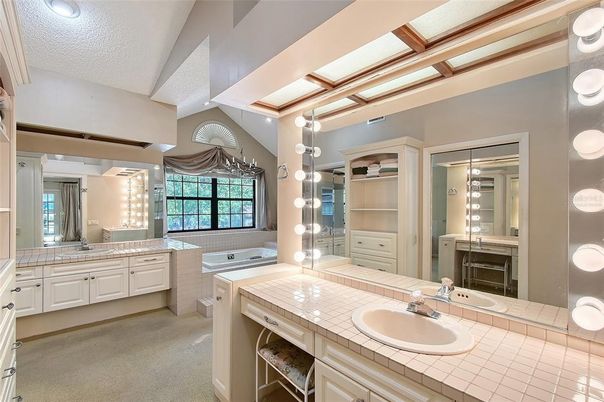 Bathroom, Dual Sink Vanities, Interior, Recessed Lighting, Tile Countertops