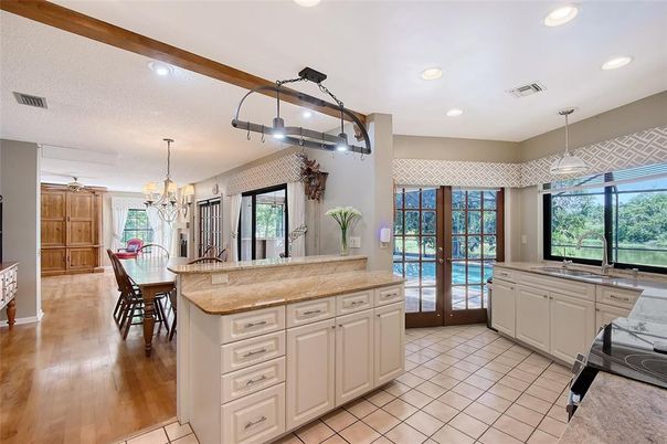 Chandelier, Dining room, Interior, Kitchen, Pendant Lights, Recessed Lighting, Wood Texture Flooring