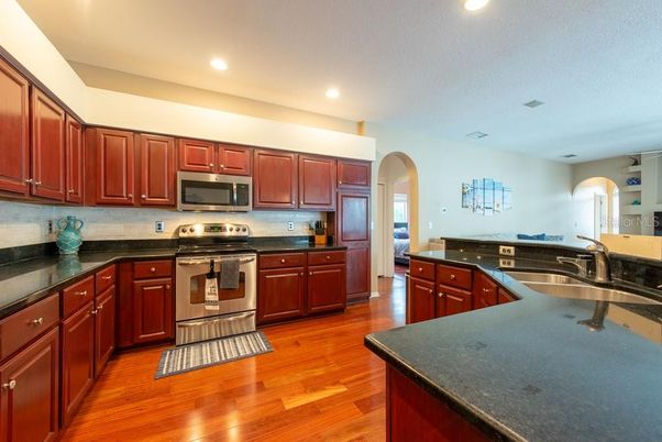 Interior, Kitchen, Recessed Lighting, Stainless Steel Appliances, Wood Texture Flooring