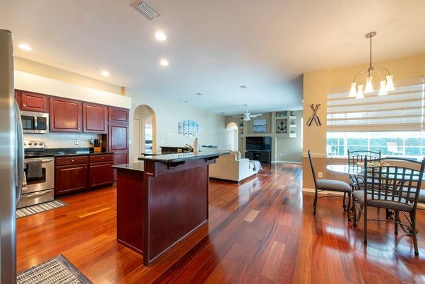 Dining room, Interior, Kitchen, Pendant Lights, Recessed Lighting, Stainless Steel Appliances, Wood Texture Flooring