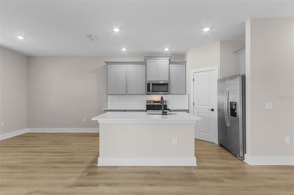 Interior, Kitchen, Recessed Lighting, Stainless Steel Appliances, Wood Texture Flooring