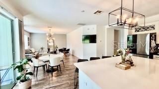 Chandelier, Dining room, Interior, Living room, Pendant Lights, Wood Texture Flooring