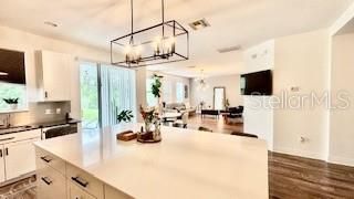 Chandelier, Interior, Kitchen, Living room, Pendant Lights, Recessed Lighting, Wood Texture Flooring