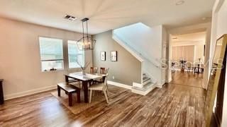 Chandelier, Dining room, Interior, Wood Texture Flooring