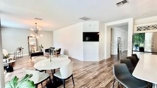 Dining room, Interior, Living room, Pendant Lights, Wood Texture Flooring