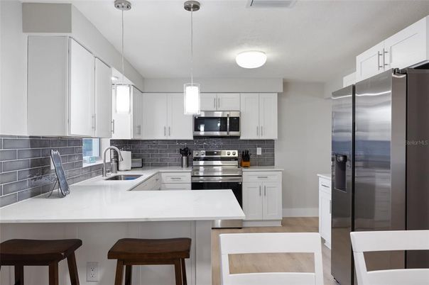 Interior, Kitchen, Pendant Lights, Stainless Steel Appliances, Wood Texture Flooring
