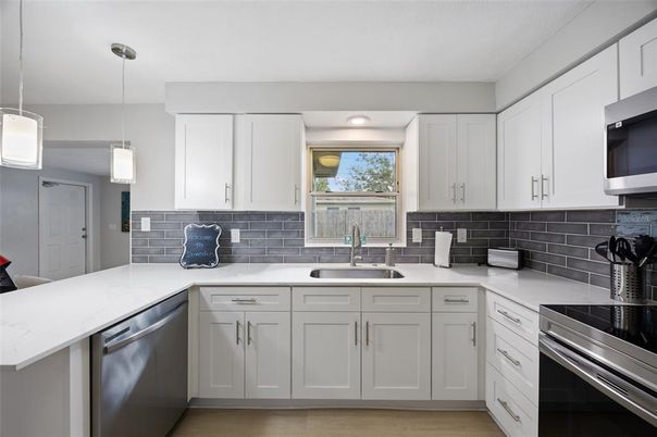 Interior, Kitchen, Pendant Lights, Recessed Lighting, Stainless Steel Appliances, Wood Texture Flooring