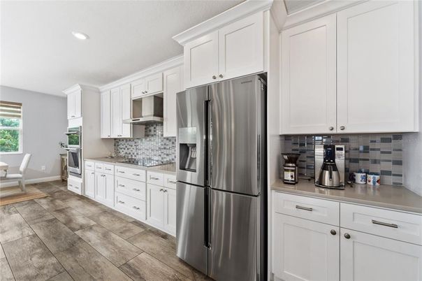 Dining room, Interior, Kitchen, Recessed Lighting, Stainless Steel Appliances, Wood Texture Flooring