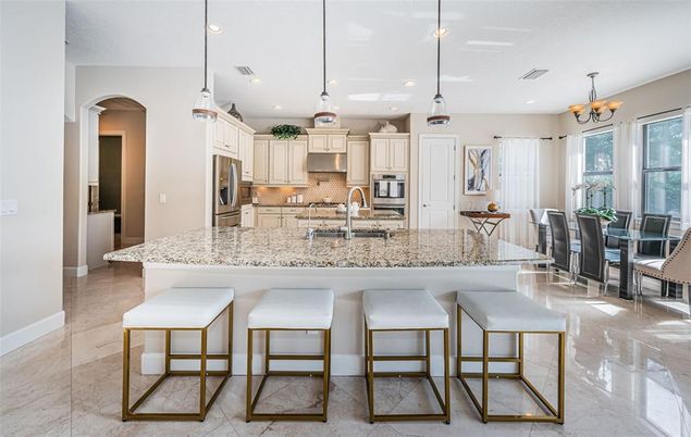 Chandelier, Dining room, Interior, Kitchen, Pendant Lights, Recessed Lighting, Stainless Steel Appliances