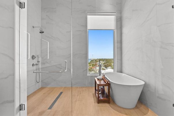 Bathroom, Free Standing Baths, Glass Shower, Interior, Marble Walls, Wood Texture Flooring