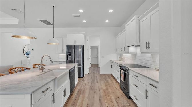 Interior, Kitchen, Pendant Lights, Recessed Lighting, Stainless Steel Appliances, Wood Texture Flooring