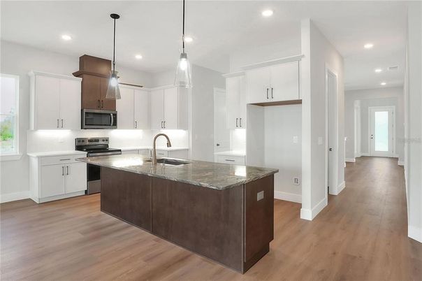 Interior, Kitchen, Pendant Lights, Recessed Lighting, Stainless Steel Appliances, Wood Texture Flooring