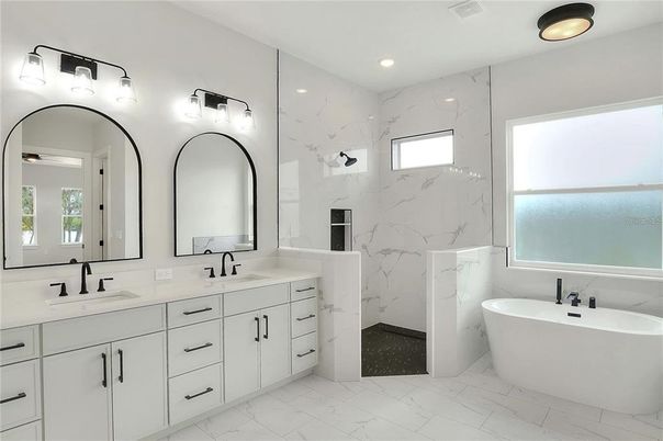 Bathroom, Dual Sink Vanities, Free Standing Baths, Interior, Marble, Marble Walls, Recessed Lighting