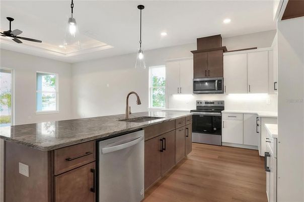 Interior, Kitchen, Pendant Lights, Recessed Lighting, Stainless Steel Appliances, Wood Texture Flooring