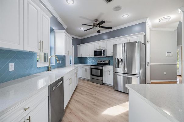 Interior, Kitchen, Recessed Lighting, Stainless Steel Appliances, Wood Texture Flooring