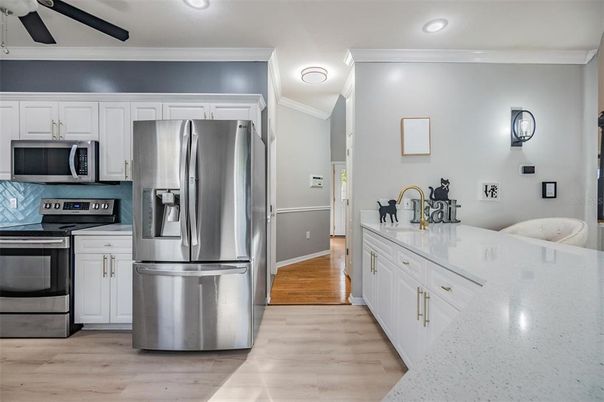 Interior, Kitchen, Recessed Lighting, Stainless Steel Appliances, Wood Texture Flooring