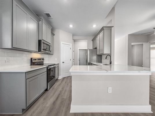 Interior, Kitchen, Recessed Lighting, Stainless Steel Appliances, Wood Texture Flooring