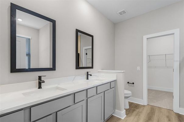 Bathroom, Dual Sink Vanities, Interior, Recessed Lighting, Wood Texture Flooring