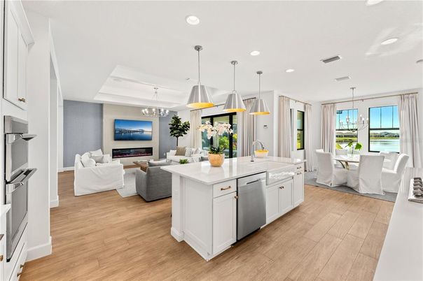 Dining room, Fireplace, Interior, Kitchen, Living room, Pendant Lights, Recessed Lighting, Water, Wood Texture Flooring