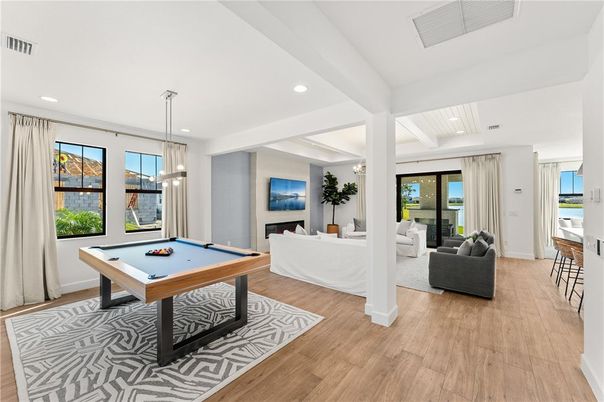 Billiard Table, Game Room, Interior, Living room, Pendant Lights, Recessed Lighting, Wood Texture Flooring