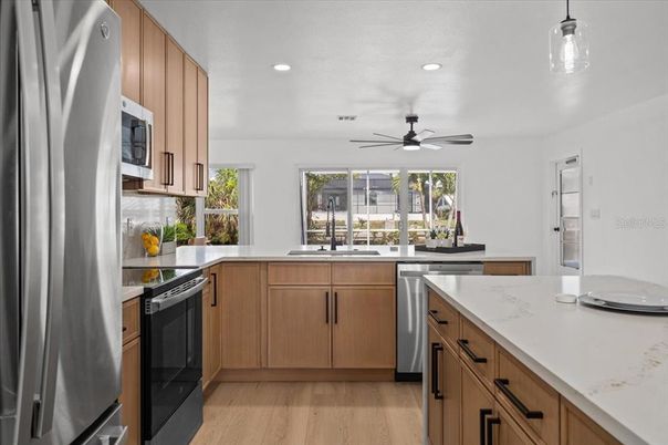 Interior, Kitchen, Recessed Lighting, Stainless Steel Appliances, Wood Texture Flooring
