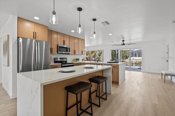 Interior, Kitchen, Pendant Lights, Recessed Lighting, Stainless Steel Appliances, Wood Texture Flooring