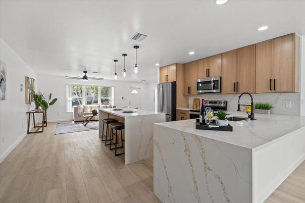 Interior, Kitchen, Pendant Lights, Recessed Lighting, Stainless Steel Appliances, Wood Texture Flooring